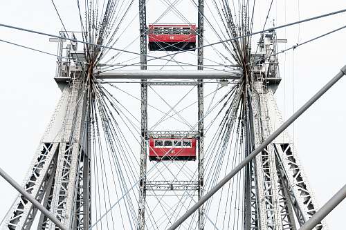 amusement park red and white metal tower ferris wheel